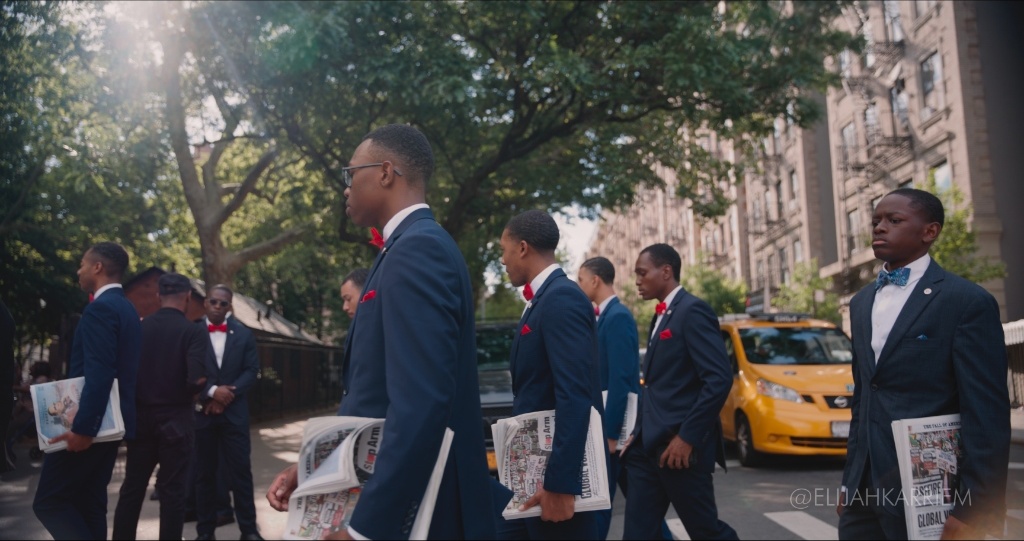 Fruit of Islam brothers marching through urban street